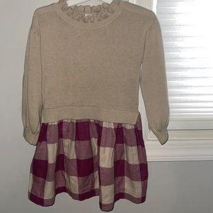 Beautiful neutral ruffle sweater with attached plaid skirt. Size 4t. Worn once.